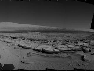 This view from NASA's Curiosity Mars rover spans 360 degrees, centered southward toward a planned science waypoint at "the Kimberley," with an outcrop of eroded sandstone in the foreground. It combines several frames taken by the Navigation Camera on March 18, 2014.