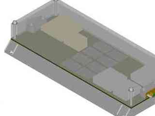 The image shows a flat rectangular box filled with capacitors, resistors, memory chips, and other electronic parts.