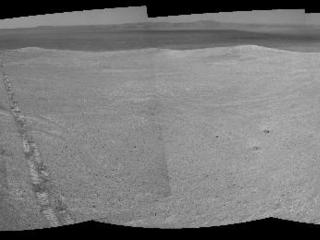 The component images for this 360-degree panorama were taken by the navigation camera on NASA's Mars Exploration Rover Opportunity after the rover drove about 97 feet southeastward on April 22, 2014. The location is on the western rim of Endeavour Crater. The two parallel tracks are 3.3 feet apart.