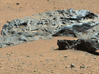 This rock encountered by NASA's Curiosity Mars rover is an iron meteorite called "Lebanon," similar in shape and luster to iron meteorites found on Mars by the previous generation of rovers, Spirit and Opportunity.