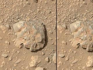 NASA's Curiosity Mars rover used the camera on its arm on July 12, 2014, to catch the first images of sparks produced by the rover's laser being shot at a rock on Mars.  The left image is from before the laser zapped this rock, called "Nova."  The spark is at the center of the right image.