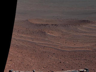 This false-color view from NASA's Mars Exploration Rover Opportunity shows "Lunokhod 2 Crater," which lies south of Solander Point on the west rim of Endeavour Crater.