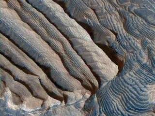Periodic Layering in Martian Sedimentary Rocks