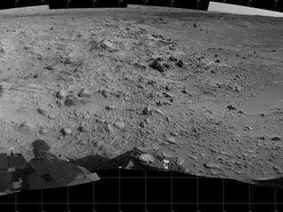This panorama of the landscape surrounding NASA's Curiosity Mars rover on July 31, 2014, offers a view into sandy lower terrain called "Hidden Valley," which is on the planned route ahead.