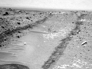 In this image from NASA's Curiosity Mars rover looking up the ramp at the northeastern end of "Hidden Valley," a pale outcrop including drilling target "Bonanza King" is at the center of the scene.