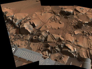 This view from the Mast Camera (Mastcam) on NASA's Curiosity Mars rover shows a swath of bedrock called "Alexander Hills," which the rover approached for close-up inspection of selected targets. It is a mosaic of six frames taken on Nov. 23, 2014.