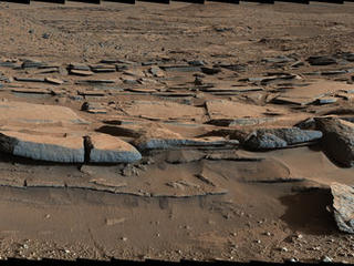 This March 25, 2014, view from the Mastcam on NASA's Curiosity Mars rover looks southward at the Kimberley waypoint. In the foreground, multiple sandstone beds show systematic inclination to the south suggesting progressive build-out of delta sediments in that direction (toward Mount Sharp).