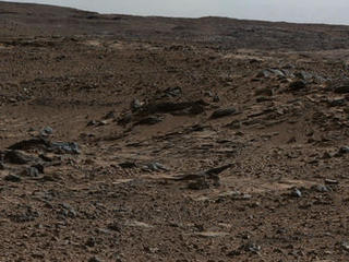 This image shows inclined beds characteristic of delta deposits where a stream entered a lake, but at a higher elevation and farther south than other delta deposits north of Mount Sharp. This suggests multiple episodes of delta growth building southward. It is from Curiosity's Mastcam.