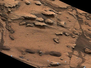 This image shows an example of a thin-laminated, evenly stratified rock type that occurs in the "Pahrump Hills" outcrop at the base of Mount Sharp on Mars. The Mastcam on NASA's Curiosity Mars rover acquired this view on Oct. 28, 2014. This type of rock can form under a lake.