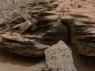 This view from the Mastcam on NASA's Curiosity Mars rover shows an example of cross-bedding that results from water  passing over a loose bed of sediment. It was taken Nov. 2, 2014, at a target called "Whale Rock" within the "Pahrump Hills" outcrop at the base of Mount Sharp.