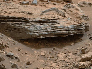 Cross-bedding seen in the layers of this Martian rock is evidence of movement of water recorded by the waves or ripples of loose sediment the water passed over, such as a current in a lake. This image was acquired by the Mastcam on NASA's Curiosity Mars rover on Nov. 2, 2014.