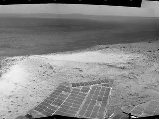 NASA's Mars Exploration Rover Opportunity recorded this view just after reaching the summit of "Cape Tribulation," on the western rim of Endeavour Crater, on Jan. 6, 2015, the 3,894th Martian day, or sol, of the rover's work on Mars.