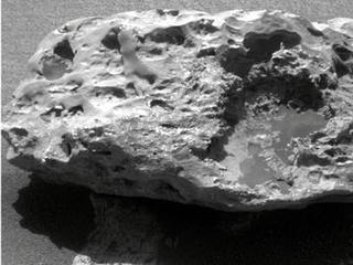 Composition measurements by NASA's Mars Exploration Rover Opportunity confirm that this rock on the Martian surface is an iron-nickel meteorite.