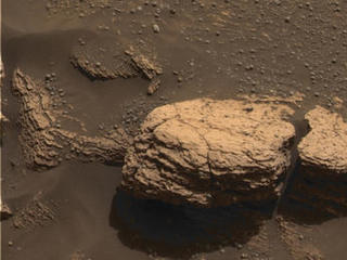 This color image taken by the panoramic camera onboard the Mars Exploration Rover Opportunity shows the part of the rock outcrop dubbed Stone Mountain at Meridiani Planum, Mars.