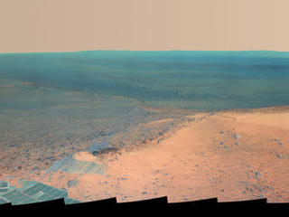 NASA's Mars Exploration Rover Opportunity obtained this view from the top of the "Cape Tribulation" segment of the rim of Endeavour Crater. The rover reached this point three weeks before the 11th anniversary of its January 2004 landing on Mars.