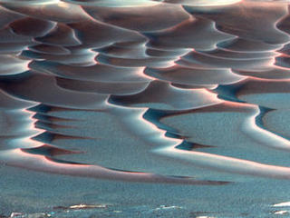 As NASA's Mars Exploration Rover Opportunity creeps farther into "Endurance Crater," the dune field on the crater floor appears even more dramatic