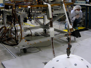 This image shows testing of InSight's robotic arm at JPL about two years before it will perform these tasks on Mars.