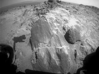 The flat-faced rock near the center of this image is a target for contact investigation by NASA's Mars Exploration Rover Opportunity in early March 2015.