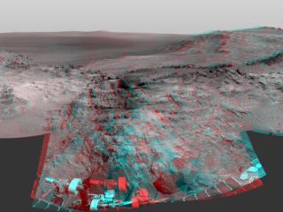 Cumulative driving by NASA's Mars Exploration Rover Opportunity surpassed marathon distance on March 24, 2015, as the rover neared a destination called "Marathon Valley," which is middle ground of this stereo view from early March.