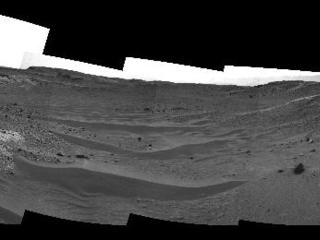 This April 10, 2015, view from the Navigation Camera on NASA's Curiosity Mars rover shows the terrain ahead of the rover as it makes its way westward through a valley called "Artist's Drive."