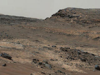 A sweeping panorama combining 33 telephoto images into one Martian vista presents details of several types of terrain visible on Mount Sharp from a location along the route of NASA's Curiosity Mars rover. The component images were taken by the rover's Mast Camera on April 10, 2015.