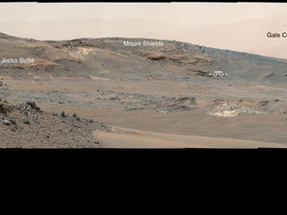 This April 16, 2015, panorama from the Mast Camera on NASA's Curiosity Mars rover shows a detailed view toward two areas on lower Mount Sharp chosen for close-up inspection in subsequent weeks: "Mount Shields" and "Logan Pass."