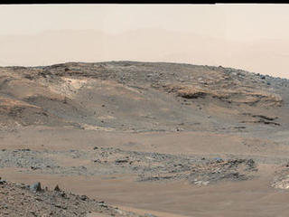 This April 16, 2015, panorama from the Mast Camera on NASA's Curiosity Mars rover shows a detailed view toward two areas on lower Mount Sharp chosen for close-up inspection in subsequent weeks: "Mount Shields" and "Logan Pass."