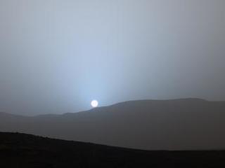 NASA's Curiosity Mars rover recorded this view of the sun setting at the close of the mission's 956th Martian day, or sol (April 15, 2015), from the rover's location in Gale Crater.
