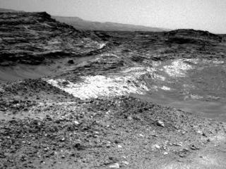 The Martian outcrop where pale rock meets darker overlying rock near the middle of this May 21, 2015, view is an example of a geological contact. Such contacts can reveal clues about how environmental conditions that produced one type of rock were related to conditions that produced the other.