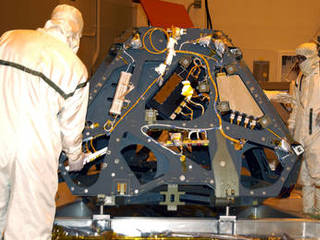 The Mars Exploration Rover-2 is moved to a workstand in the Payload Hazardous Servicing Facility.