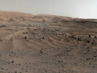 A panorama combining images from both cameras of the Mastcam on NASA's Curiosity Mars Rover shows diverse geological textures on Mount Sharp. Three years after landing on Mars, the mission is investigating this layered mountain for evidence about changes in Martian environmental conditions.