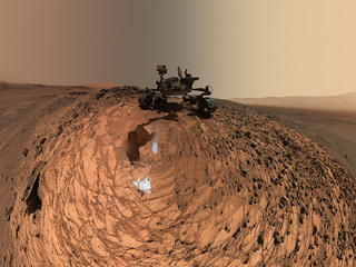 This low-angle self-portrait of NASA's Curiosity Mars rover from Aug. 5, 2015, shows the vehicle above the "Buckskin" rock target in the "Marias Pass" area of lower Mount Sharp. The MAHLI camera on Curiosity's robotic arm took dozens of images that were stitched together into this sweeping panorama.