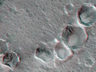 This May 2015 image from the HiRISE camera on NASA's Mars Reconnaissance Orbiter shows a location on Mars associated with the best-selling novel and Hollywood movie, "The Martian." It is in a region called Acidalia Planitia, at the landing site for the science-fiction tale's Ares 3 mission.
