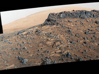 This March 27, 2015, view from the Mast Camera (Mastcam) on NASA's Curiosity Mars rover shows a site with a network of prominent mineral veins below a cap rock ridge on lower Mount Sharp. At this "Garden City" site, the veins have been more resistant to erosion than the surrounding host rock.