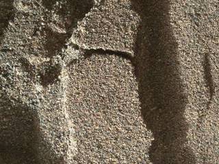 In an up-close 1-inch-wide view, grains of sand near a Martian sand dune are imaged by the arm camera on NASA's Mars rover Curiosity Mars rover.