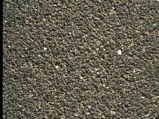 This Dec. 5, 2015, view of the undisturbed surface of a Martian sand dune called "High Dune" shows coarse grains remaining on the surface after wind removal of smaller particles. The image covers an area 1.4 inches across. It was taken by the rover's Mars Hand Lens Imager (MAHLI).