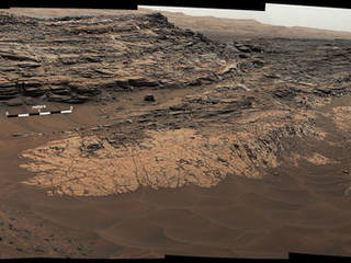 This May 22, 2015, view from the Mast Camera (Mastcam) in NASA's Curiosity Mars rover shows the "Marias Pass" area where a lower and older geological unit of mudstone -- the pale zone in the center of the image -- lies in contact with an overlying geological unit of sandstone.