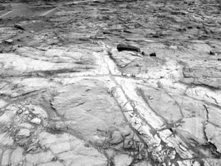 This view from NASA's Curiosity Mars rover shows an example of discoloration closely linked to fractures in the Stimson formation sandstone on lower Mount Sharp.