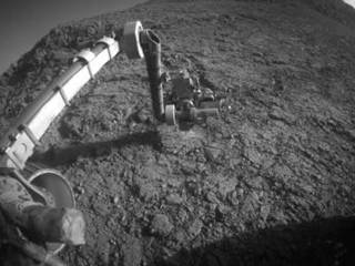 The target beneath the tool turret at the end of the rover's robotic arm in this image from NASA's Mars Exploration Rover Opportunity is "Private John Potts." It lies high on the southern side of "Marathon Valley," which slices through the western rim of Endeavour Crater.
