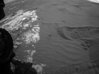 This view captures Curiosity's current work area where the rover continues its campaign to study an active sand dune on Mars.