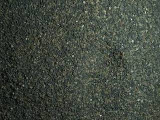 The Mars Hand Lens Imager (MAHLI) camera on the robotic arm of NASA's Curiosity Mars rover used electric lights at night on Jan. 22, 2016, to illuminate this postage-stamp-size view of Martian sand grains dumped on the ground after sorting with a sieve.