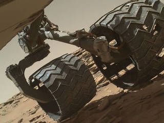 The team operating NASA's Curiosity Mars rover uses the Mars Hand Lens Imager (MAHLI) camera on the rover's arm to check the condition of the wheels at routine intervals.