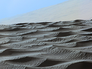 Two sizes of ripples are evident in this Dec. 13, 2015, view of a top of a Martian sand dune, from NASA's Curiosity Mars rover. Sand dunes and the smaller type of ripples also exist on Earth.  The larger ripples are a type not seen on Earth nor previously recognized as a distinct type on Mars.