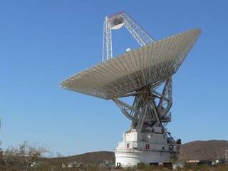 The giant, 70-meter-wide antenna at NASA's Deep Space Network complex in Goldstone, Calif., tracks a spacecraft on Nov. 17, 2009.