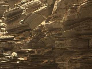 This closeup view from NASA's Curiosity rover shows finely layered rocks, deposited by wind long ago as migrating sand dunes.