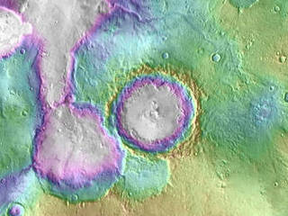 Valleys much younger than well-known ancient valley networks on Mars are evident near the informally named "Heart Lake" on Mars. This map presents color-coded topographical information overlaid onto a photo mosaic. Lower elevations are indicated with white and purple; higher elevations, yellow.