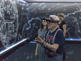 Apollo 11 astronaut Buzz Aldrin, right, and Erisa Hines of NASA's Jet Propulsion Laboratory in Pasadena, California, try out the Microsoft Hololens mixed reality headset during a preview of "Destination: Mars" at Kennedy Space Center visitor complex in Florida.