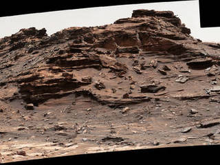 The top of the butte in this Sept. 1, 2016, scene from the Mast Camera (Mastcam) on NASA's Curiosity Mars rover stands about 16 feet above the rover and about 82 feet east-southeast of the rover. The site is in the "Murray Buttes" area of lower Mount Sharp, and this particular butte is called "M9a."