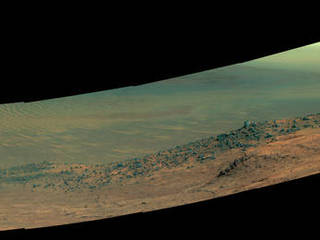 This scene from NASA's Mars rover Opportunity shows "Wharton Ridge," on the western rim of Endeavour Crater. The ridge's name honors the memory of astrobiologist Robert A. Wharton (1951-2012). The scene is presented in enhanced color to make differences in surface materials more easily visible.
