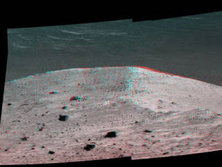 This stereo scene from NASA's Mars Exploration Rover Opportunity shows "Spirit Mound" overlooking the floor of Endeavour Crater. The view appears three-dimensional when seen through blue-red glasses with the red lens on the left.